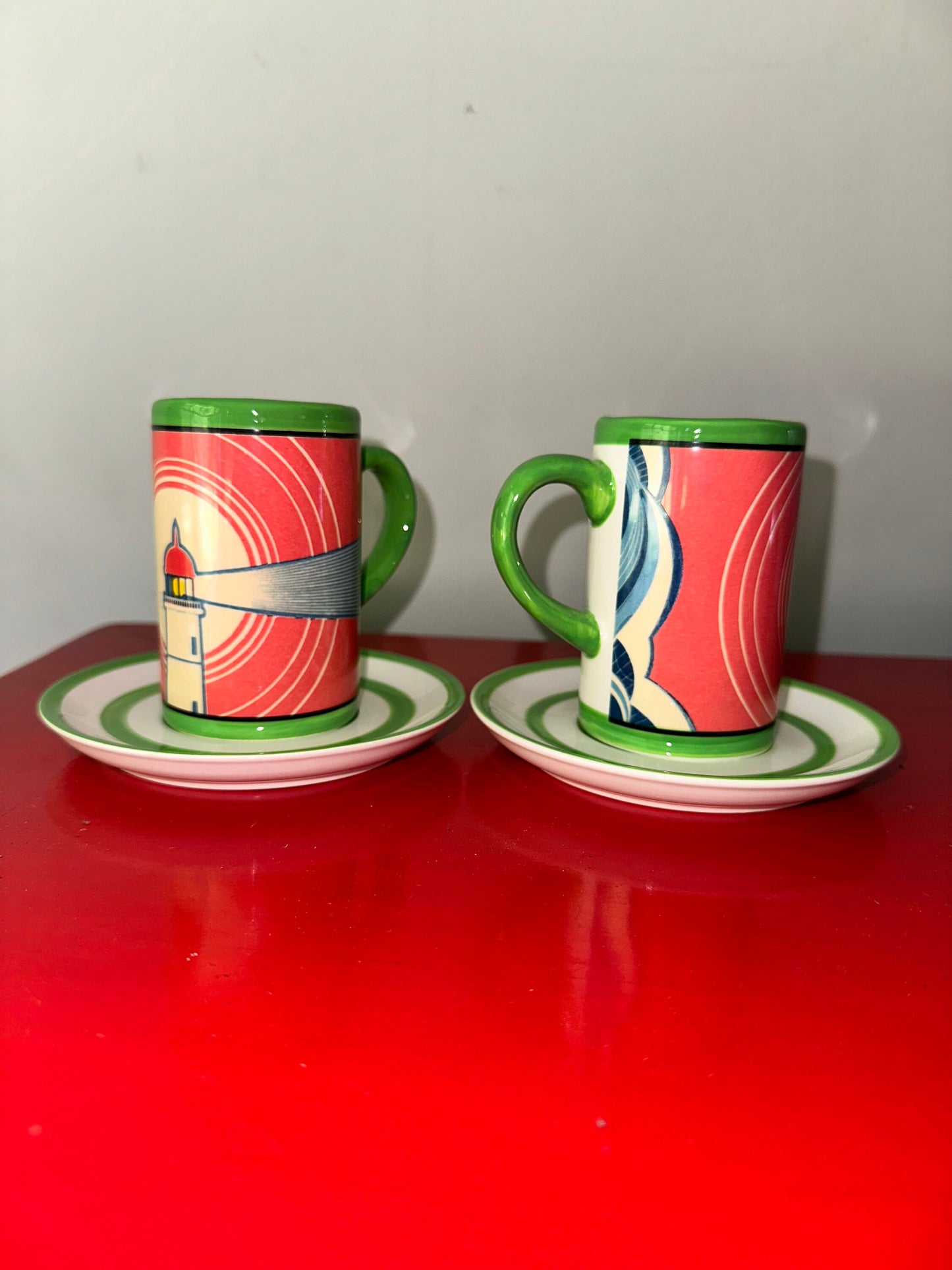 Tsunami lighthouse tall coffee cups with matching saucers
